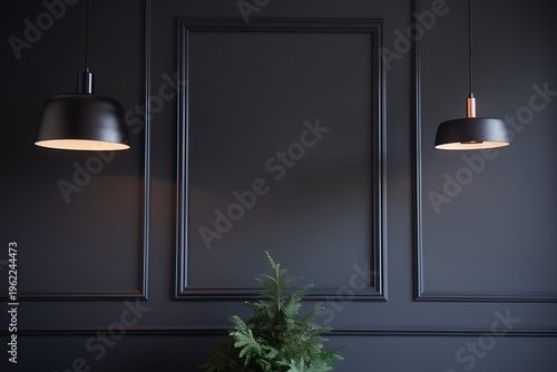 Empty black picture frame on wall with lamps and green leaves for mockup
