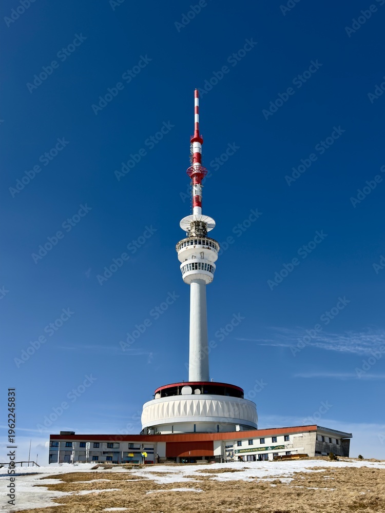 Obraz premium Praded television tower and mountain hotel on the summit in winter, Jeseniki, Czech Republic