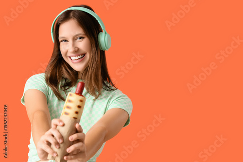Young woman in headphones w...