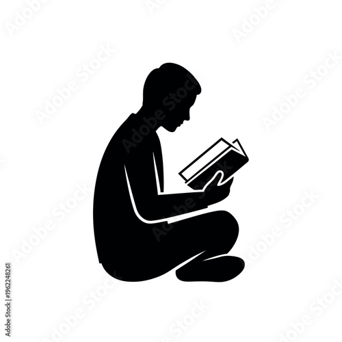Silhouette of Person Sitting and Reading a Book