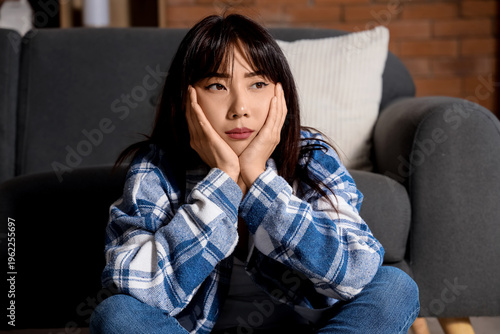 Young Asian woman with suic...