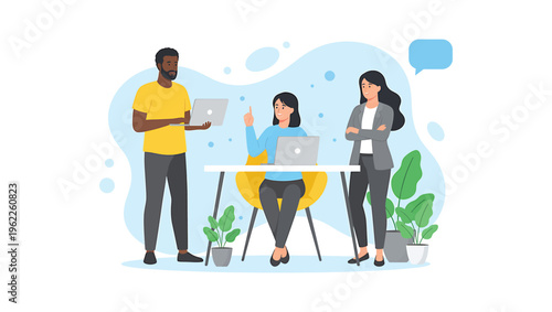 Team of businesspeople working with computers having conversation and dialogue together at work. Laptop and papers lie open on the desk. Bright light fills the clean, minimalist office