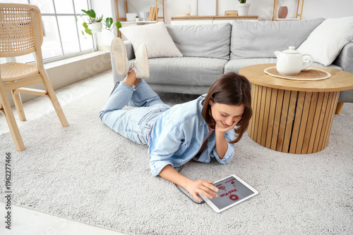 Young woman using tablet co...