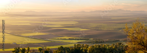 Εκτύπωση καμβά Agricultural plains at sunrise south of Carmona, Spain, seen from the castle