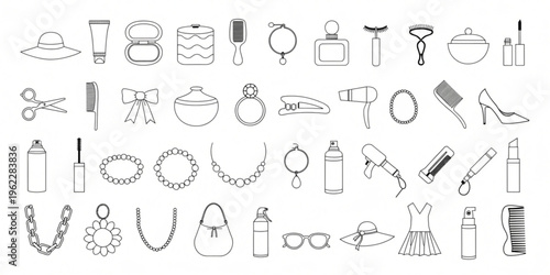 Fashion accessories and beauty products are laid out on a table indoors.