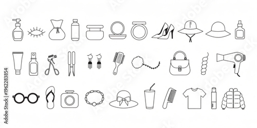 Various personal care and fashion items are arranged on a surface.