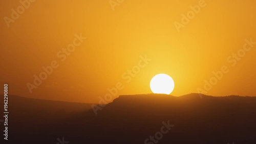 Sunset over Mysterious Desert Landscape Zoom Out Timelapse