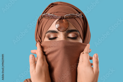 Beautiful Muslim woman in b...