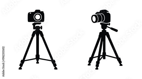 Two camera setups on tripods displayed as a striking black silhouette