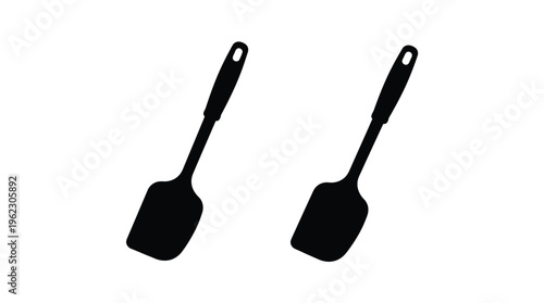 Two black spatula silhouettes against a plain white background silhouette