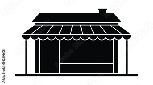 Simple black storefront with awning and chimney a stark silhouette
