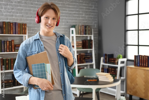 Male student with headphone...