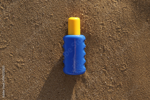 Bottle of sunscreen cream o...