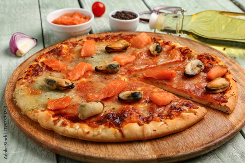 Plate of tasty seafood pizz...