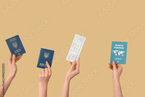 Women holding Ukrainian and...