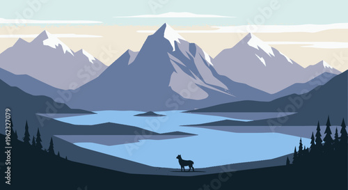 A solitary deer stands by a serene mountain lake.