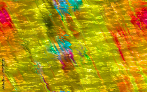 Abstract fluid texture background. Yellow vibrant liquid motion pattern. Colorful artistic paint design