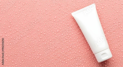 Mockup of white cosmetic tube on pink background for skincare product