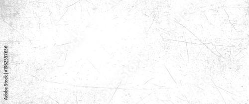 White textured background with subtle grey scratches and speckles