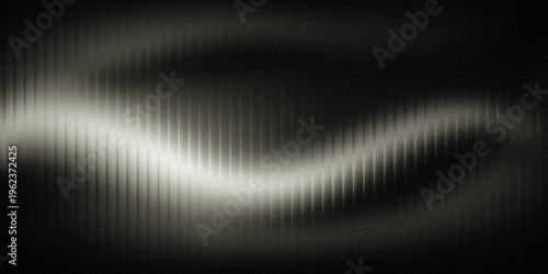 A grayscale image of a sound wave with a white curved line on a black background