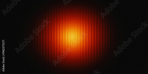 A vibrant orange light shines brightly in the darkness, surrounded by a halo of red and black hues.
