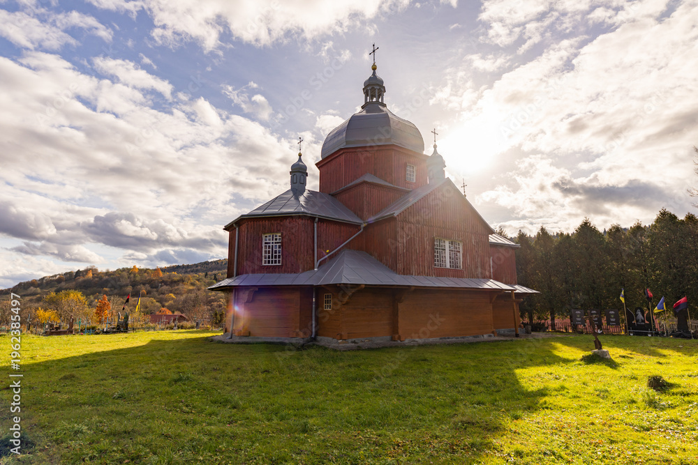Fototapeta premium Ancient wooden St. Nicholas Church in Urych village, Ukraine