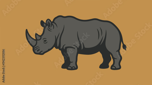A majestic rhinoceros stands proudly against a warm background.