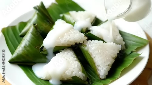 Coconut milk poured on rice.