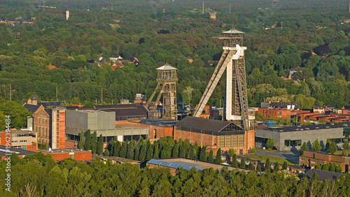 Konstfotografi Old coal mine with headgear towers of Winterslag,  in Genk, Flanders, Belgium