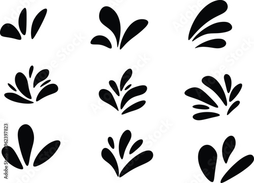 Abstract organic splash shapes collection with leaf and petal silhouettes isolated on white background