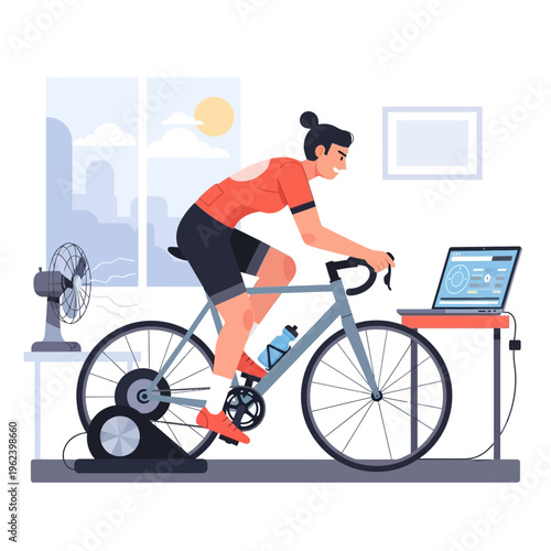 Woman cycling indoors on smart trainer with laptop and fan, home fitness