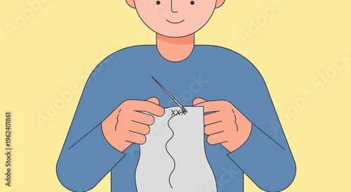 A person knitting a scarf with yarn and needles in a cozy indoor setting