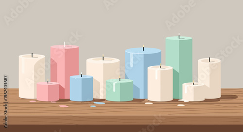 Colorful candles arranged on a wooden table indoors