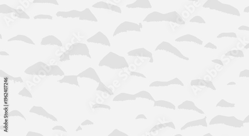 Many small grey clouds in sky.