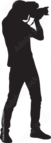 Silhouette of a man taking a photo with a camera