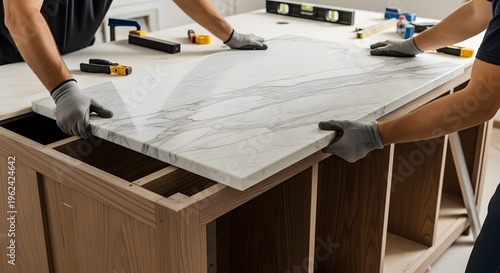 Professional Installation of a Marble Countertop on a Kitchen Island.