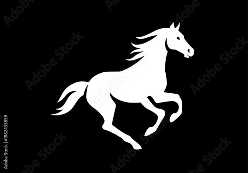 Silhouette of rearing horse prancing on hind legs against black background