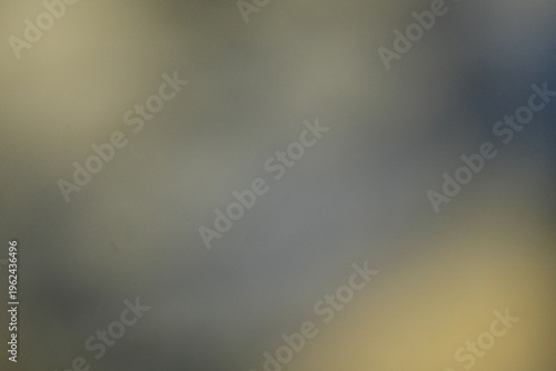 Warm Beige and Blue Bokeh Background with Soft Light Gradient Glow