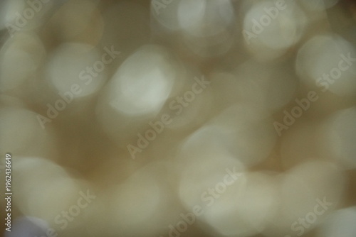 Bright Golden Bokeh Lights Background with Sparkling Warm Glow