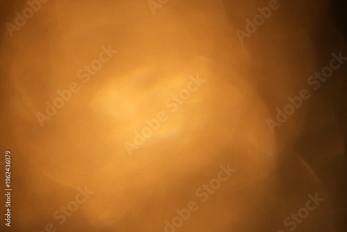 Warm Orange Golden Bokeh Lights Background with Large Soft Circles