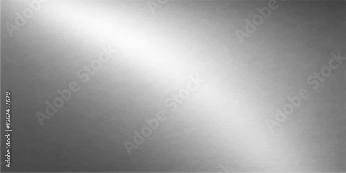 Polished silver stainless steel plate with a brushed metal texture featuring a shiny metallic chrome pattern and light gray reflection for a sleek aluminum backdrop illustration