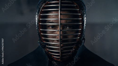 Japanese kendo warrior dramatic portrait men helmet mask martial arts rain intense gaze bushido discipline fighter spirit traditional armor sport competition training power strength determination