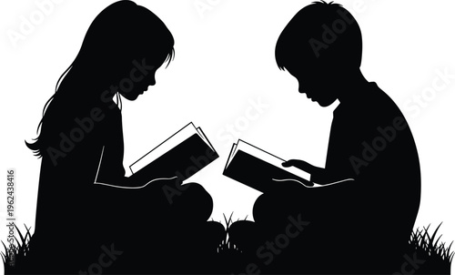 Two children silhouetted reading books outdoors in grass