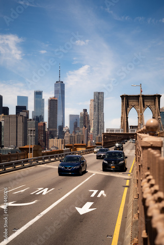 Walking across the Brooklyn Bridge in New York City.