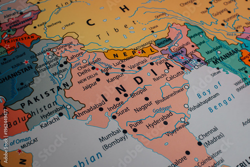 Colorful paper map showing India, Pakistan and neighboring countries.