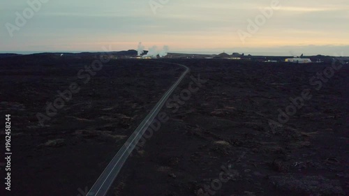 drone shot of a bridge between continents in Iceland black soil
