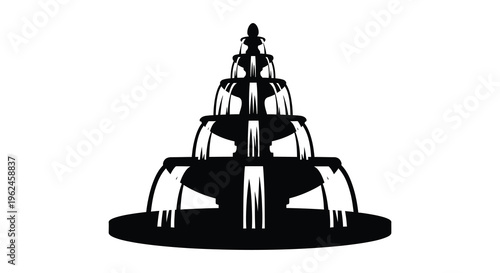 Silhouette of a large ornate fountain with water flowing from multiple tiers