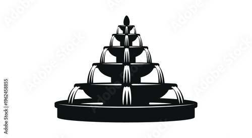 Silhouette of a multi tiered fountain with water flowing from each level