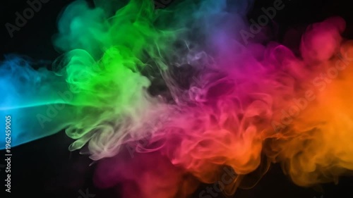 Vibrant colorful smoke plume swirling on black background