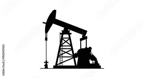 Silhouette of an oil pump jack in operation at a drilling site